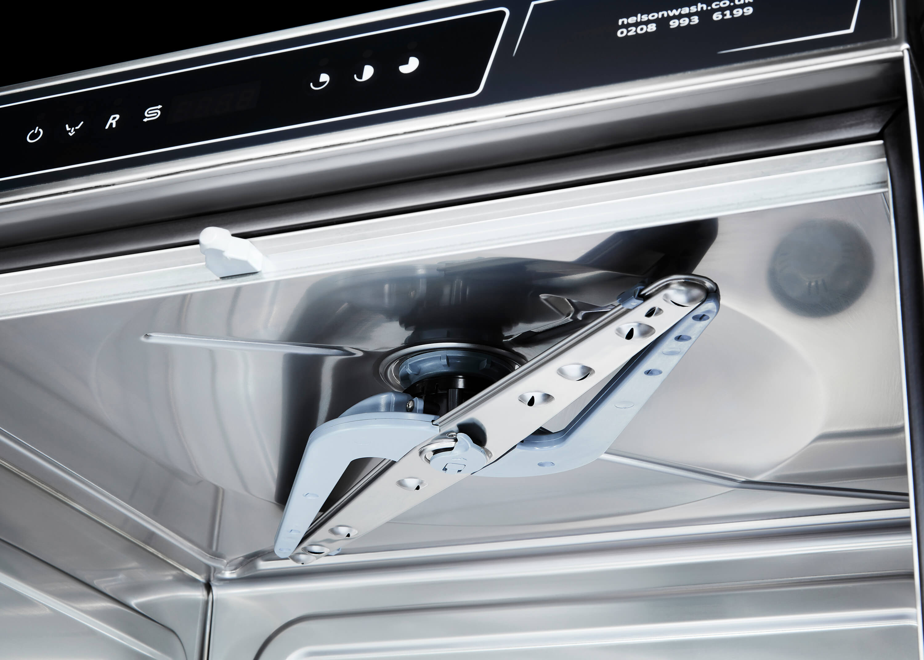 The upper wash and rinse arms on the Speedwash commercial dishwasher range